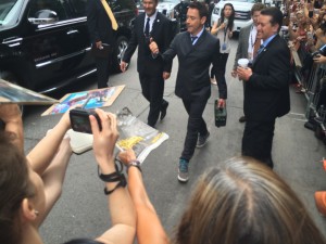 Robert Downey Jr., emerges to greet fans and press.