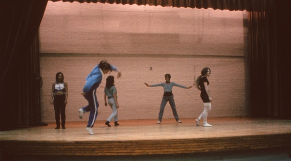 Sarah and inmates on stage in rehearsal, Krenny far right