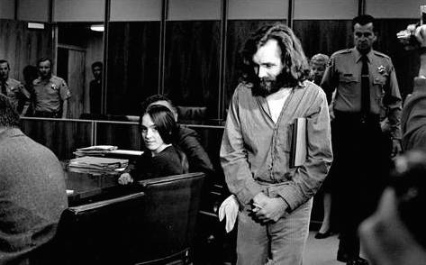 A 1970 photo of Susan Atkins watching Manson leave the courtroom