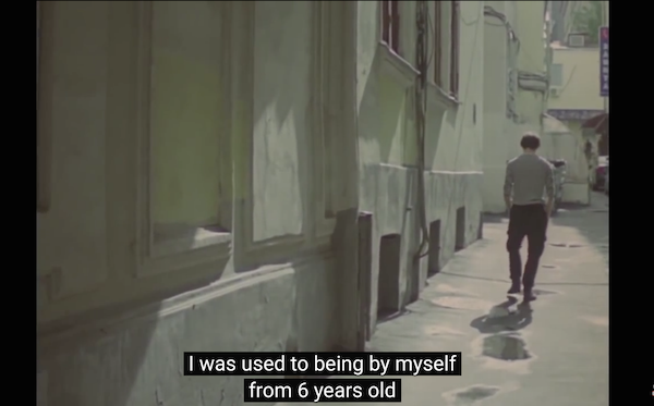 On Polunin walking alone down an  unnamed street in "The Fragile Balance"