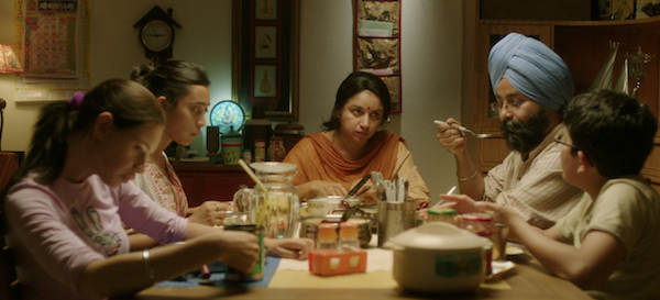 Family dinner scene in MARGARITA WITH A STRAW - Courtesy of Wolfe Video