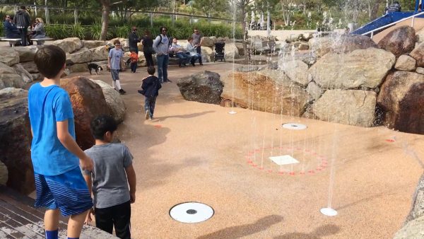 Children Playing with Water - Tongva Park. Copyright Rick Meghiddo 2017. All Rights Reserved.