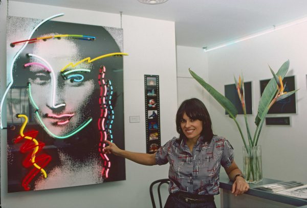 New Neon Art. Lili Lakich with her arto piesce, Mona Lisa.. Museum of Neon Art. Downtown Los Angeles