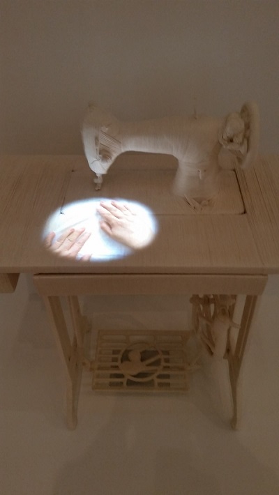 Lin Tianmiao, Sewing, 1997, sewing machine, white cotton thread, color video with sount, Take A Step Back Collection; photograph by Stephen West