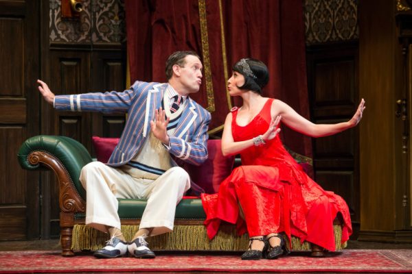 Ned Noyes & Jamie Ann Romero in The Play That Goes Wrong at The Ahmanson Theatre.