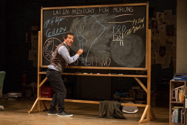 John Leguizamo at his useful blackboard in Latin History for Morons at The Ahmanson Theatre.