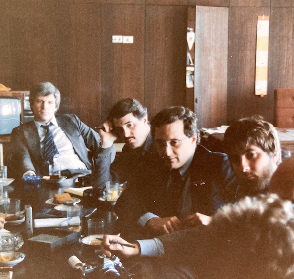 The author (with 'stash) meeting with a Pravda editor (at head of table) with other journalists in 1985. Photo: R. Daniel Foster